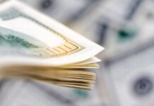 Газпромбанк сообщил о прекращении с 27 января трансграничных переводов в долларах США